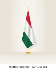 Hungary flag on a flag stand. Vector illustration.