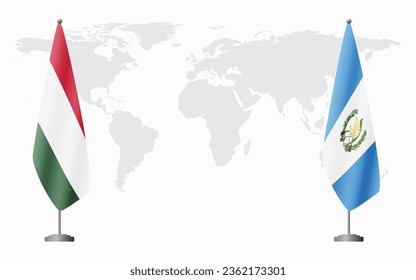 Hungary and Guatemala flags for official meeting against background of world map.