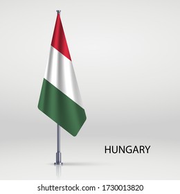 Hungary hanging flag on flagpole