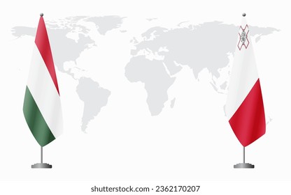 Hungary and Malta flags for official meeting against background of world map.