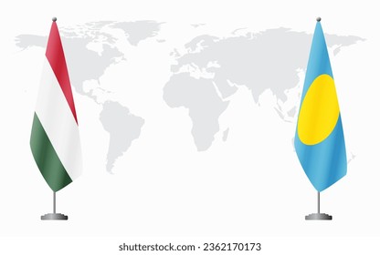 Hungary and Palau flags for official meeting against background of world map.