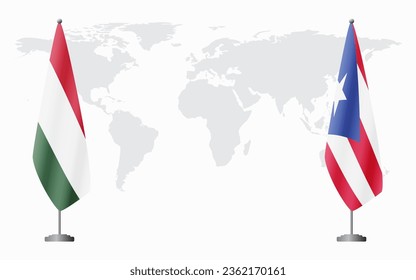 Hungary and Puerto Rico flags for official meeting against background of world map.