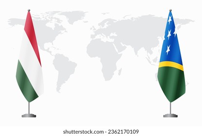 Hungary and Solomon Islands flags for official meeting against background of world map.
