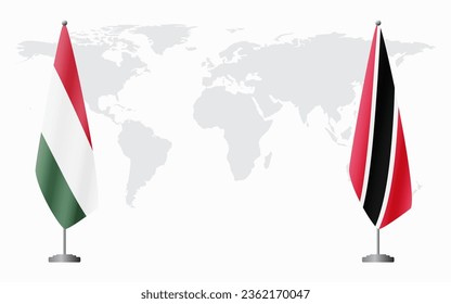 Hungary and Trinidad and Tobago flags for official meeting against background of world map.