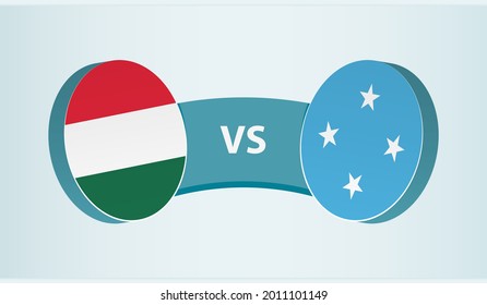 Hungary versus Micronesia, team sports competition concept. Round flag of countries.
