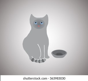 hungry gray cat sitting next to the bowl