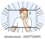 Hungry man sees empty refrigerator and is nervous about lack food due to poverty and financial crisis. Young embarrassed guy looks into refrigerator compartment surprised by lack products on shelves