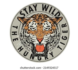 Hungry tiger face graphic print design. Animal face artwork for posters, stickers, background and others. Wild tiger logo design. 