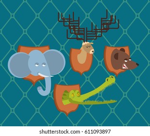 Hunter trophy set elephant and bear. Head moose and crocodile on shield. 