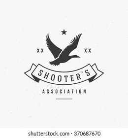 Hunting Club Logo Template. Flying Duck Silhouette Isolated On White Background. Vector object for Labels, Badges, Logos and other Design. Duck Logo, Hunter Logo, Hunting Logo, Duck Silhouette.