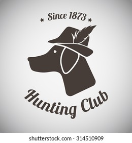 Hunting Vintage Emblem. Silhouette of Setter Head With Hunter Hat and Feather. Suitable for Advertising, Hunt Equipment, Club And Other Use. Dark Brown Retro Style.  Vector Illustration. 