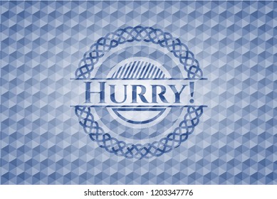 Hurry! blue emblem with geometric pattern.