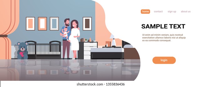 husband with pregnancy wife holding newborn baby son standing near crib happy family parenthood concept modern home bedroom interior flat full length copy space