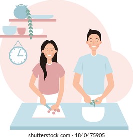 Husband and wife cook in the kitchen.Funny happy human characters.Couple cooking healthy meal. Couple having fun cooking together.Stay home concept.