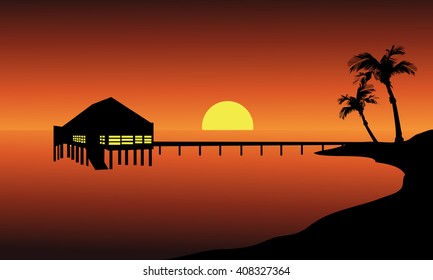 Hut in beach landscape at the sunset with sun