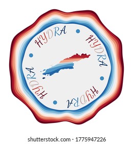 Hydra badge. Map of the island with beautiful geometric waves and vibrant red and blue frame. Vivid round Hydra logo. Vector illustration.