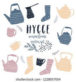 Hygge Doodle Vector Set with Teapots, Knitted Socks, Cups and Floral Hand Drawn Elements. Scandinavian Style Cosy Home Living Accessories.