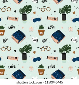 Hygge seamless pattern in vector. Cute illustration of autumn and winter hygge elements on blue background. Scandinavian trendy style