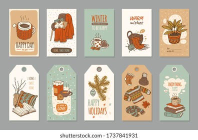 Hygge winter holidays label tag set - cozy Scandinavian style hand drawn greeting cards with warm clothes, hot food and drink, cute home decorations. Vector illustration.