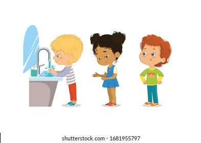 Hygiene. Children are washing their hands. Perspective of children standing at the wash basin. School girls and boys waiting to wash