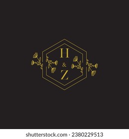 Elegante logo inicial de boda HZ en un diseño profesional de alta calidad que se imprimirá en cualquier medio impreso