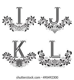 I, J, K, L vintage monograms in floral wreaths. Set of black letters in laurels.