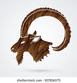 Ibex head with big horn designed using brown grunge brush graphic vector.