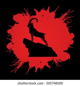 Ibex standing on the cliff designed on splash blood background graphic vector.