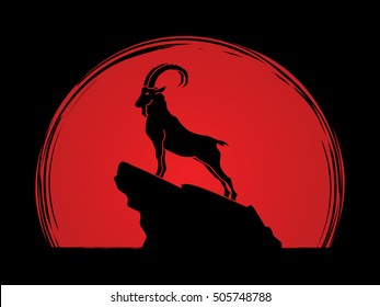 Ibex standing on the cliff designed on sunset background graphic vector.