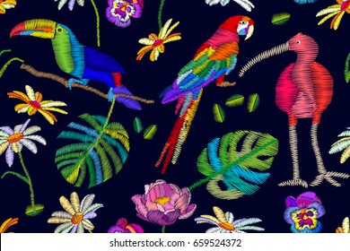 Ibis, toucan and parrot n the blooming garden. Seamless vector pattern with embroidery texture. Pansies, chamomiles, peonies, palm leaves. Textile design with oriental motifs.