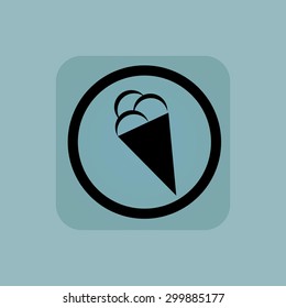Ice cream cone in circle, in square, on pale blue background