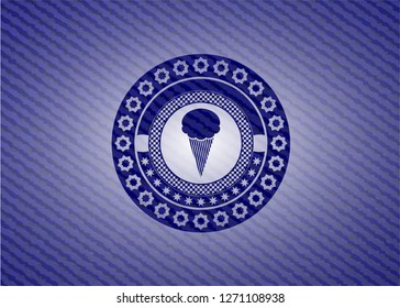 ice cream icon inside badge with denim background