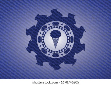 ice cream icon inside badge with denim texture