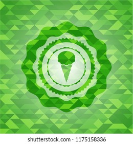 ice cream icon inside green mosaic emblem