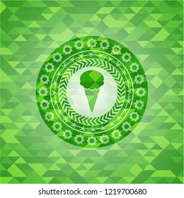 ice cream icon inside green mosaic emblem