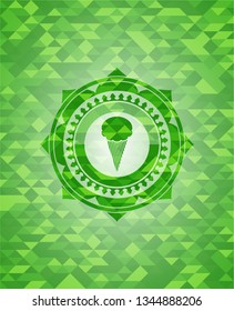 ice cream icon inside green emblem with mosaic background