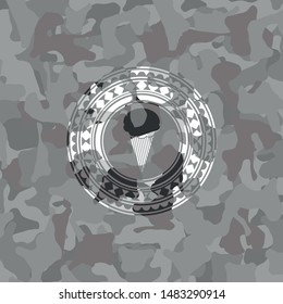ice cream icon inside grey camouflage texture
