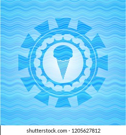 ice cream icon inside light blue water emblem background.