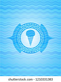 ice cream icon inside light blue water badge.