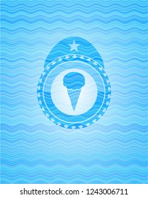 ice cream icon inside light blue water emblem.