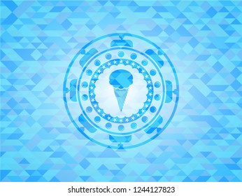 ice cream icon inside light blue mosaic emblem