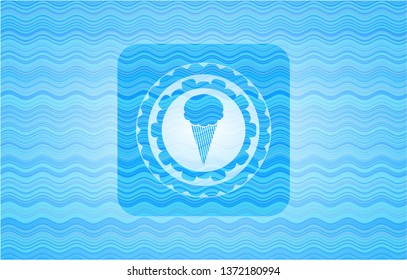 ice cream icon inside light blue water wave emblem.