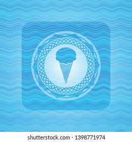 ice cream icon inside light blue water emblem background.