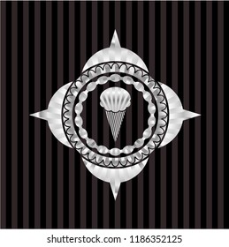 ice cream icon inside silvery badge or emblem