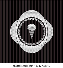 ice cream icon inside silvery badge or emblem