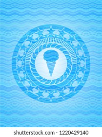 ice cream icon inside sky blue water badge.