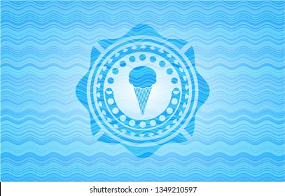 ice cream icon inside sky blue water wave style emblem.