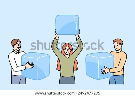 Ice cubes in hands of people who want to cool off and drink cold drinks in summer sunny weather. Happy men and woman with huge ice cubes for alcoholic cocktails or delicious natural juices