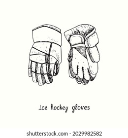 Ice hockey gloves. Ink black and white doodle drawing in woodcut style.