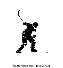 Ice hockey player shooting puck, isolated vector silhouette, ink drawing